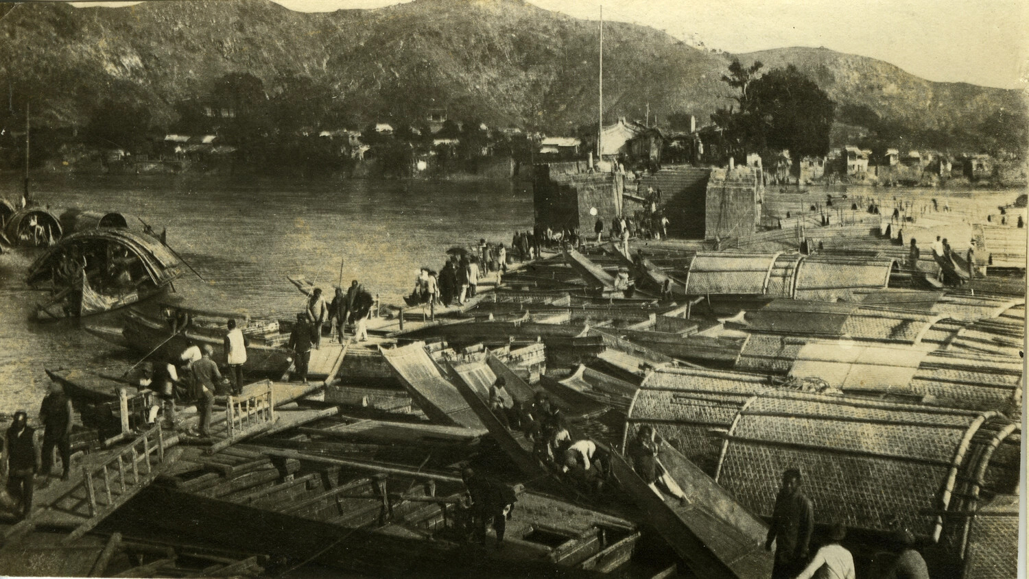 Chinese Junks and Sampans Moored at a South China or Formosa Waterfront, Early 20th Century