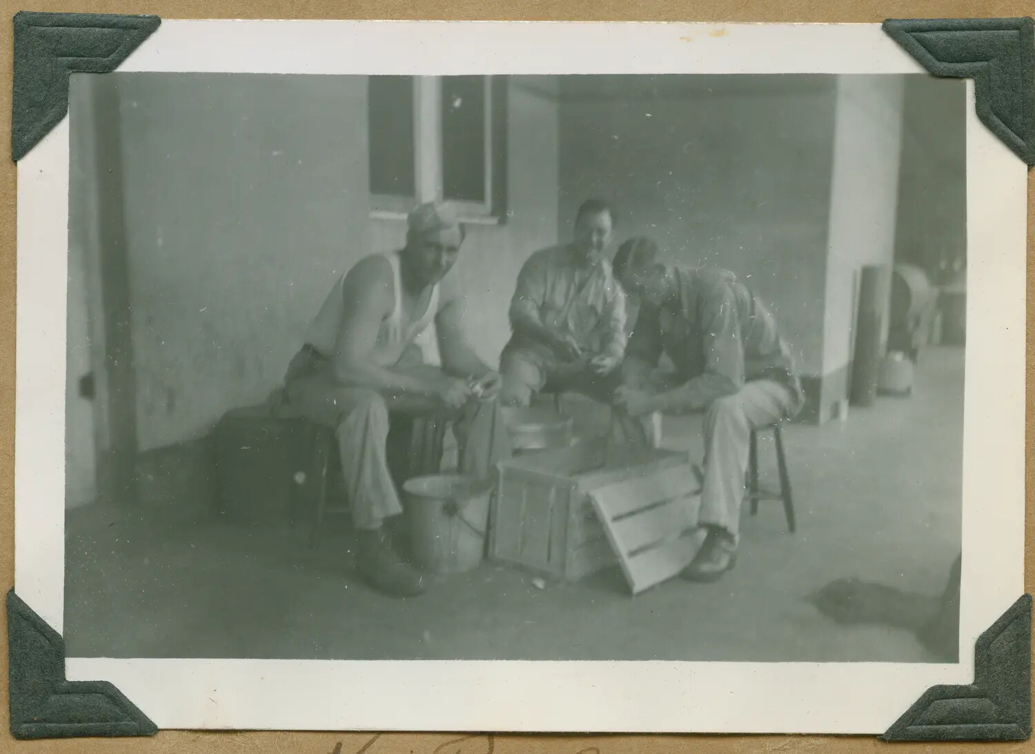 Three Soldiers Peeling Potatoes on Kitchen Police (KP) Duty, Hawaii, WWII Era