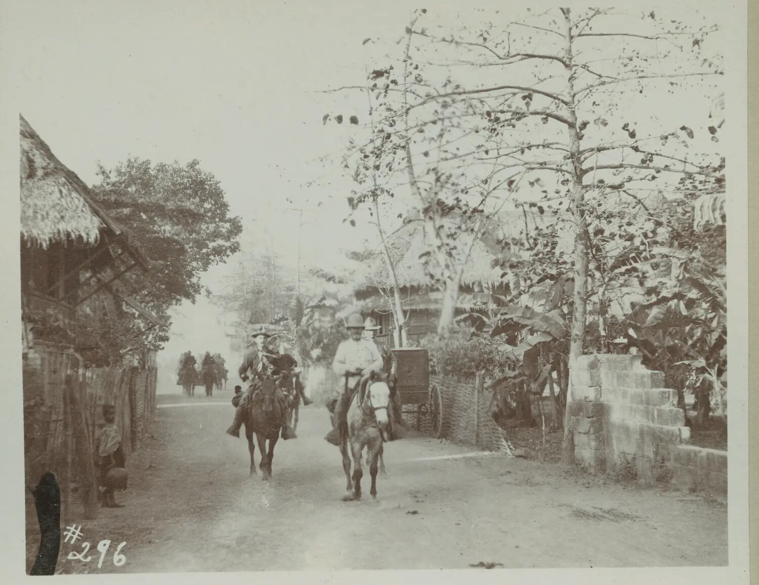 American Cavalry Officers on Horseback in Village Street, Philippines, c. 1898-1902