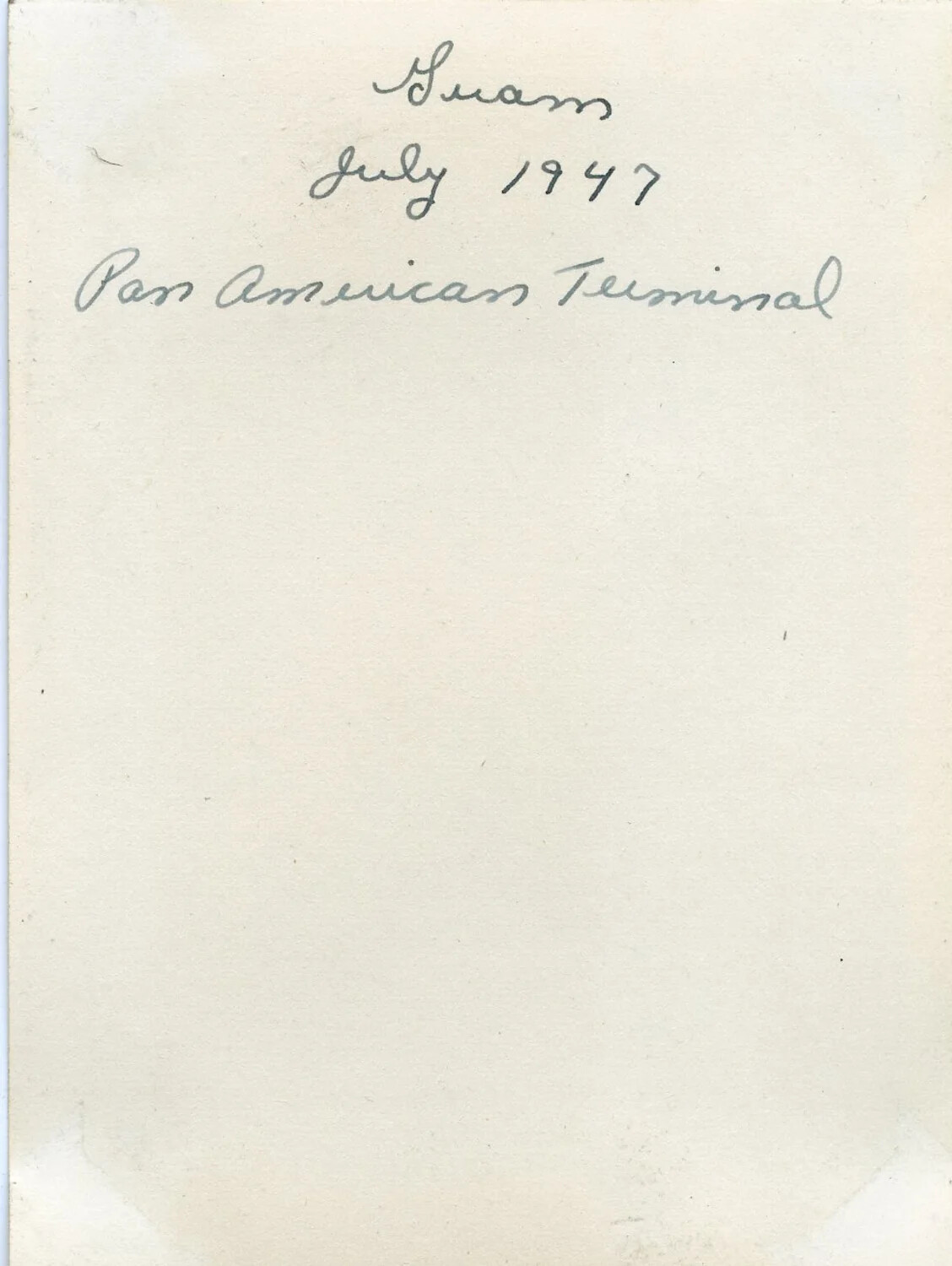 Handwritten Caption Card: 'Guam, July 1947, Pan American Terminal'