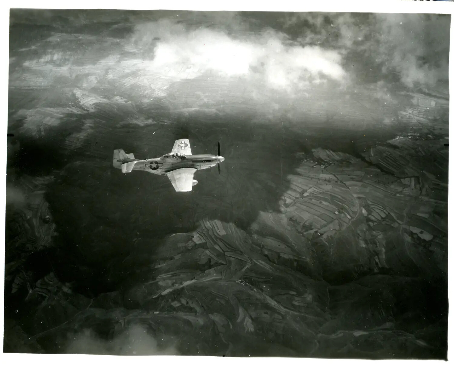 North American P-51 Mustang in Flight over Terraced Farmland, CBI Theater, WWII