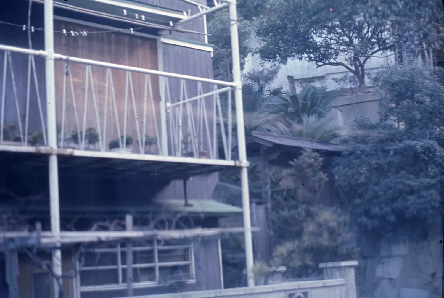 Japanese Building Under Scaffolding with Hillside Garden, Liberty Port Snapshot
