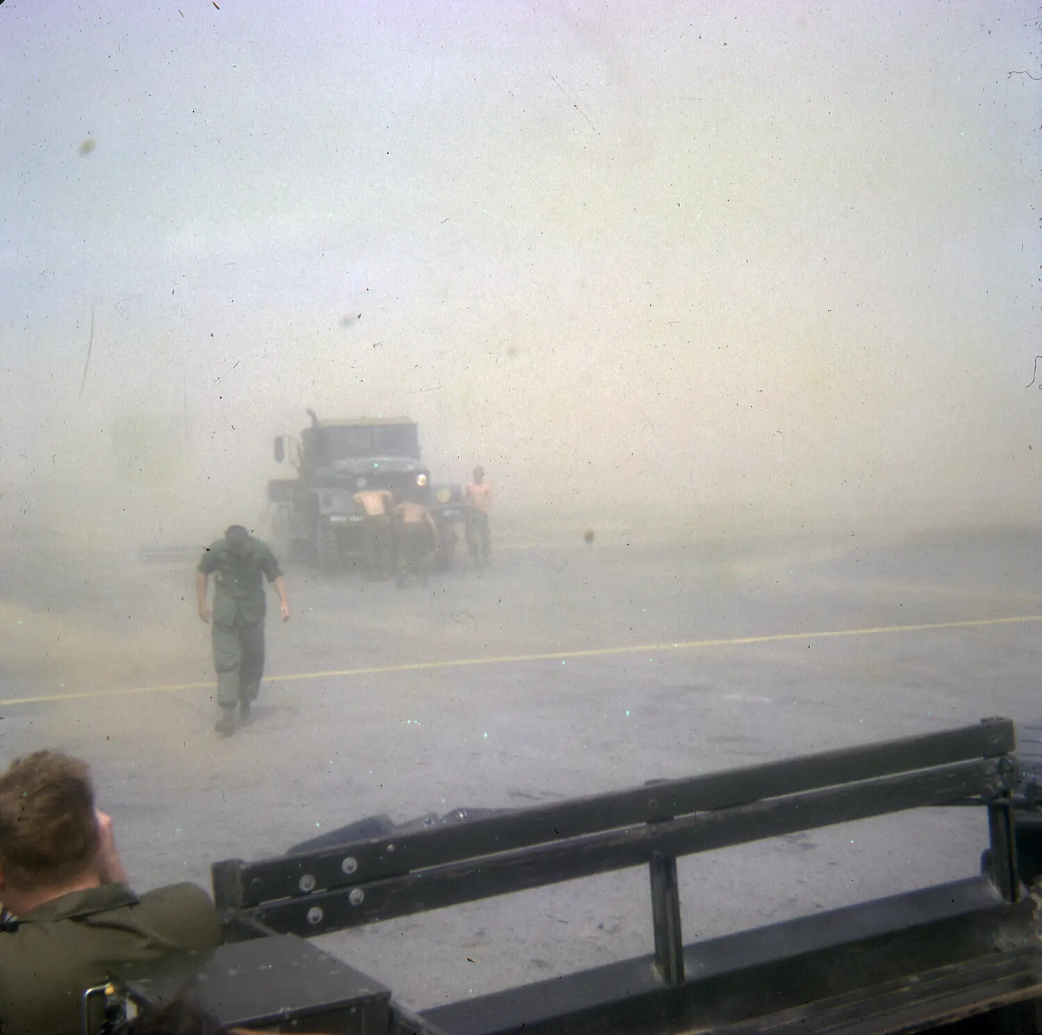 Dust Storm Enveloping Military Vehicles and Personnel, South Vietnam