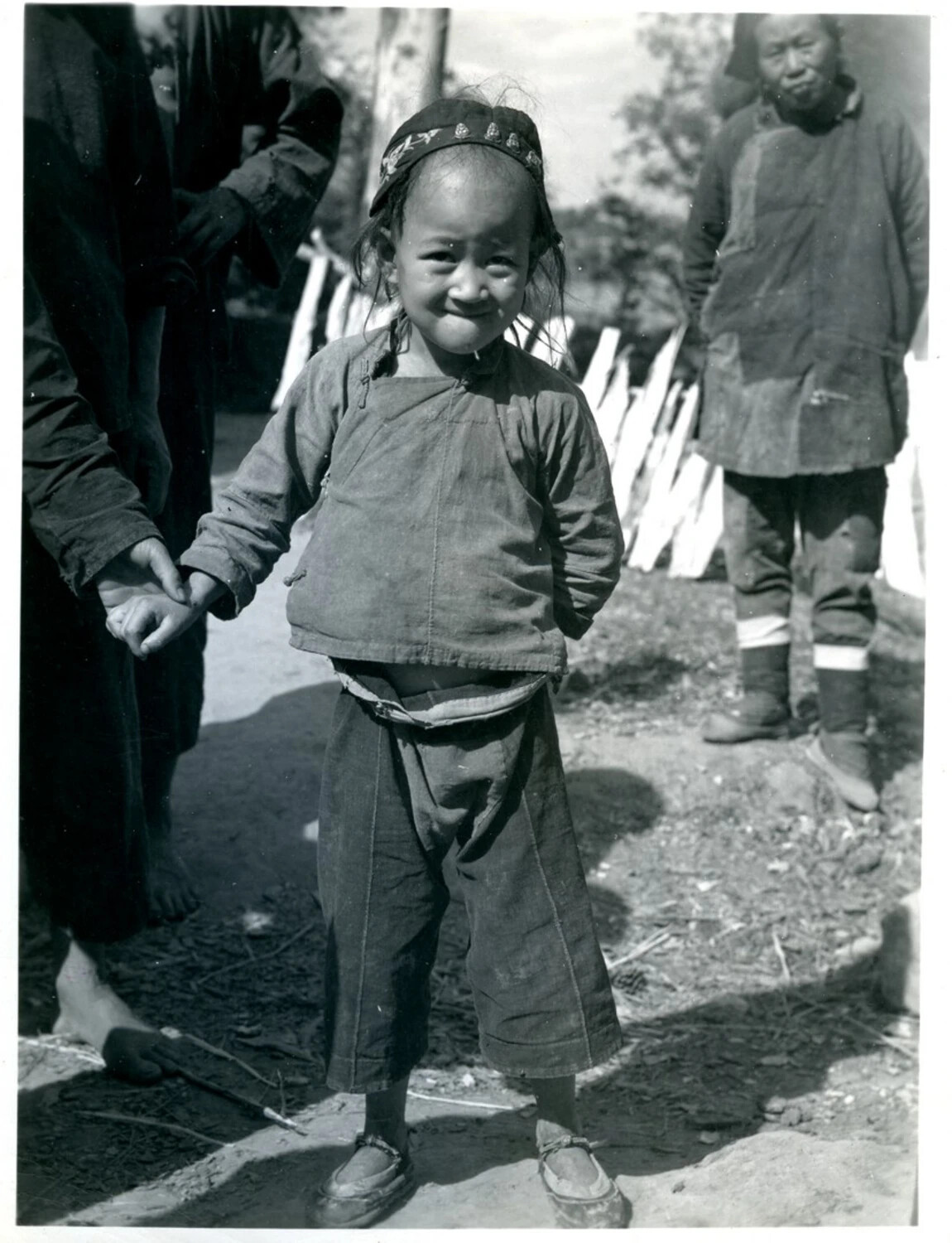 Portrait of a Local Child with Decorated Headband, China-Burma-India Theater, World War II Era