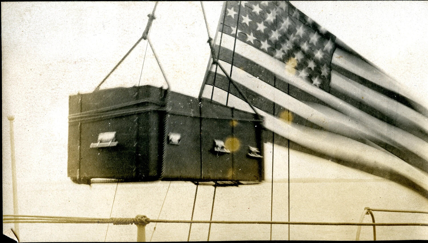 Ship's Ensign and Covered Boat in Davits Aboard USS Columbia, c. 1904-1905