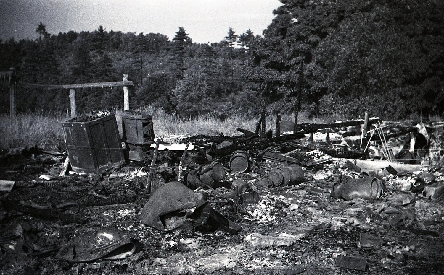 Close View of Burnt Cabinets, Drums, and Gate Posts, Dairy Farm Fire Debris, c. 1940s