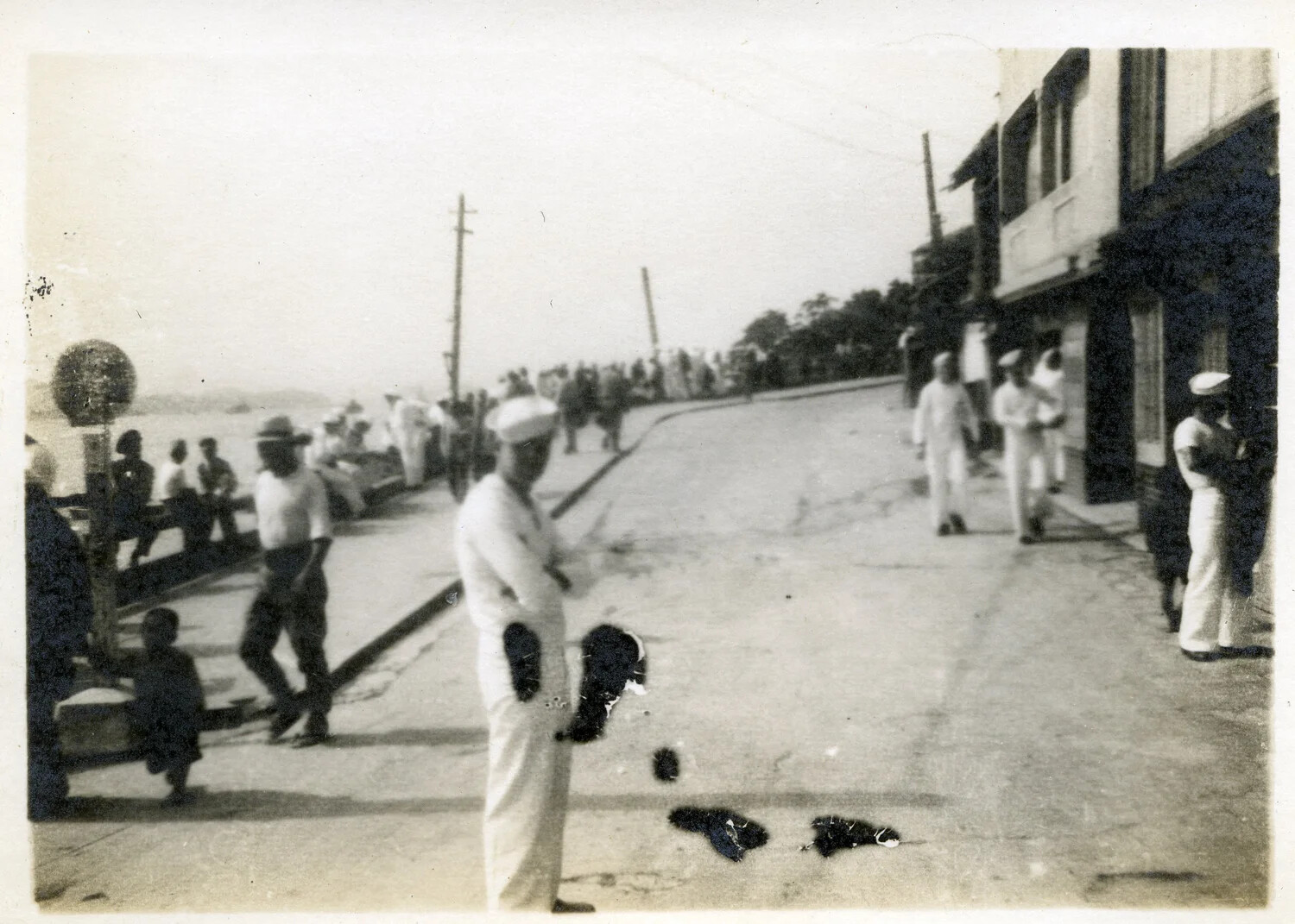 U.S. Navy Sailors on a Waterfront Street, Occupied Japan