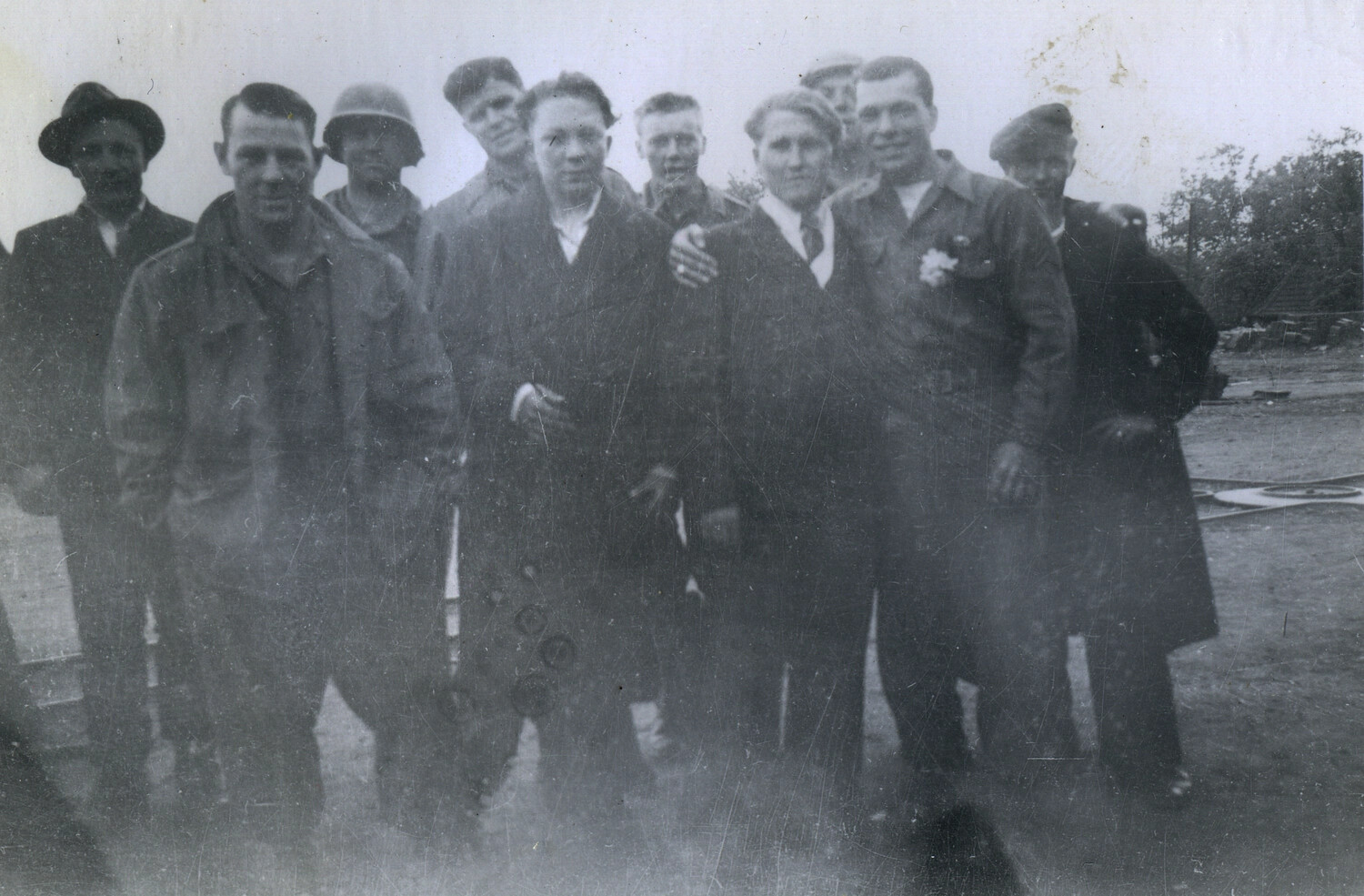 American Soldier with Group of Liberated Civilians, End of War in Europe, WWII