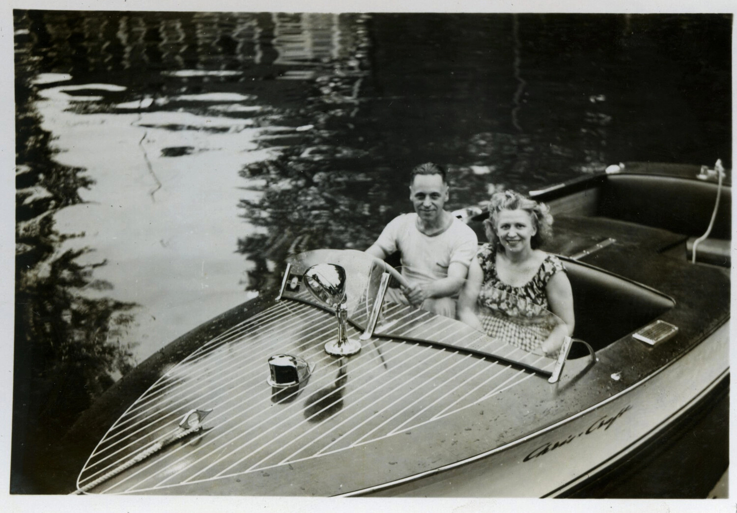 Man and Woman in Chris-Craft Runabout with Trophy, Personal Photograph — Bancroft Collection