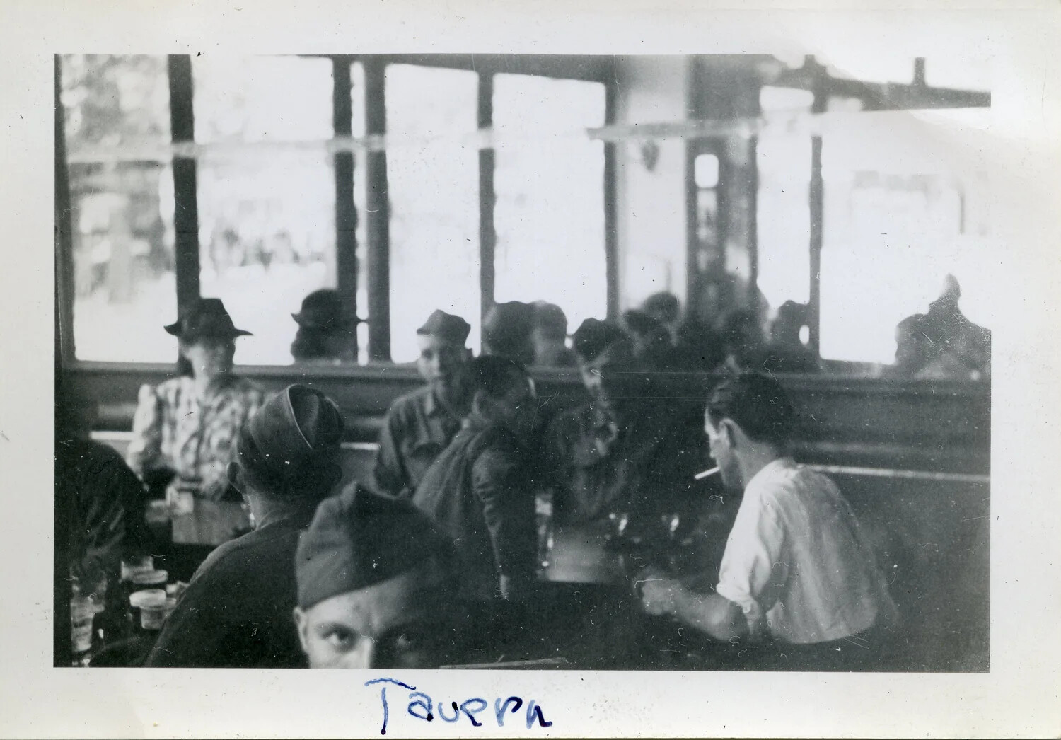 American GIs of the 44th Infantry Division in a European Tavern, WWII