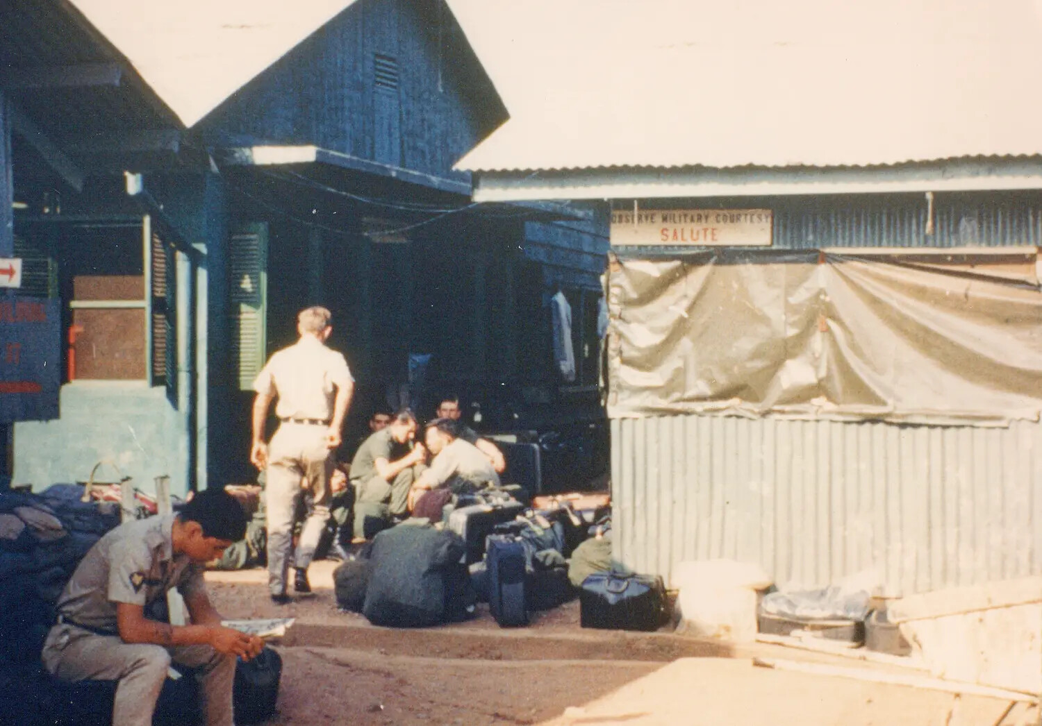 U.S. Army Personnel and Gear Outside Transit Building, Cu Chi Base Camp, South Vietnam, 1967