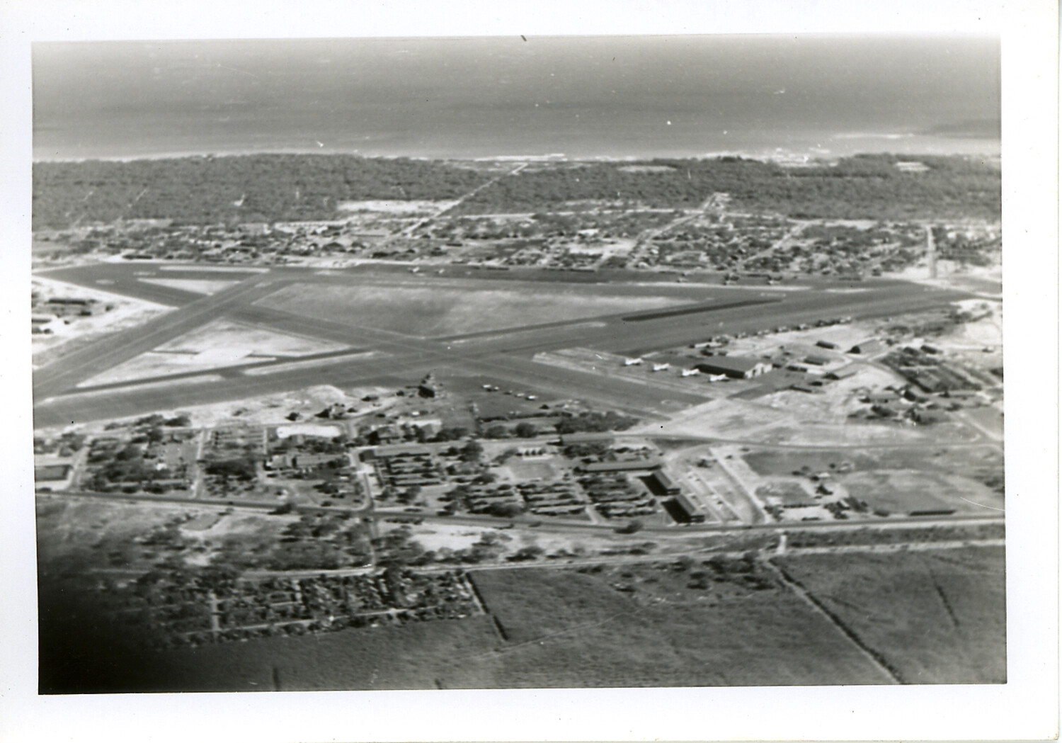 Aerial View of Crossed-Runway Military Airfield near Coastline, Hawaii
