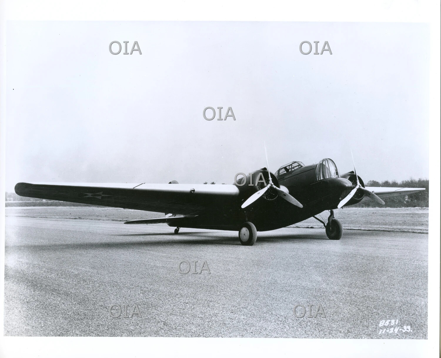 U.S. Army Air Corps Twin-Engine Light Transport Aircraft on Airfield Ramp, November 1939