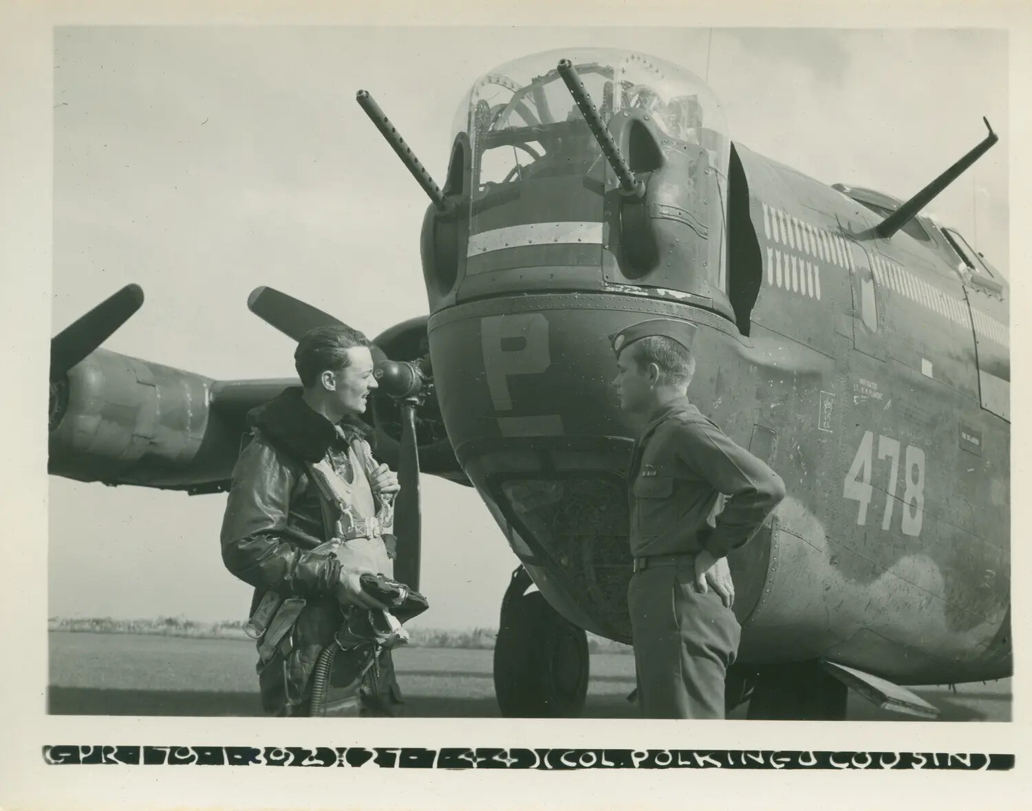Aircrew and Officer Beside the Nose Turret of B-24 Liberator '478/P', Eighth Air Force, England, 1944 (est.)