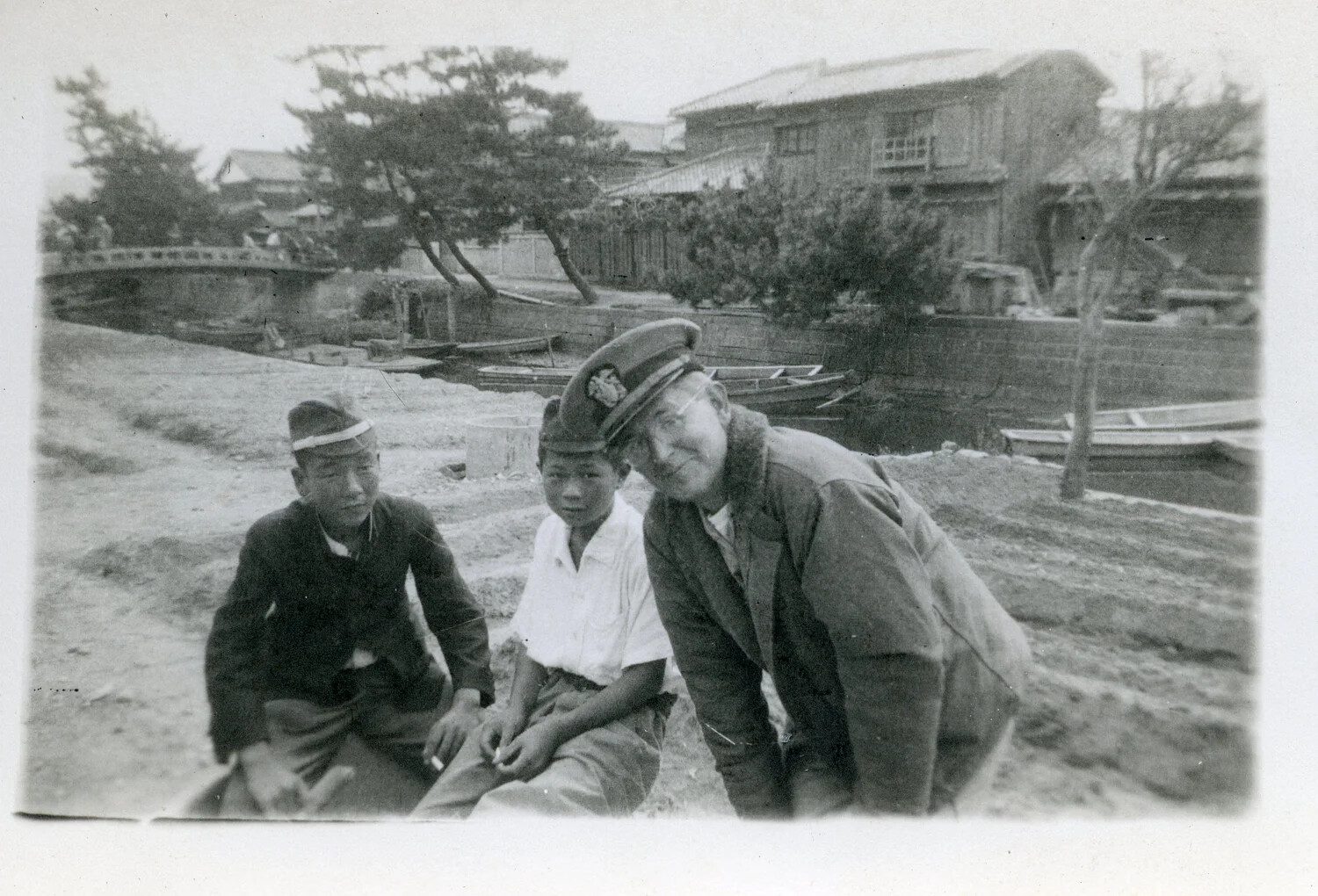 American Serviceman with Japanese Boys Beside a Canal, Occupied Japan