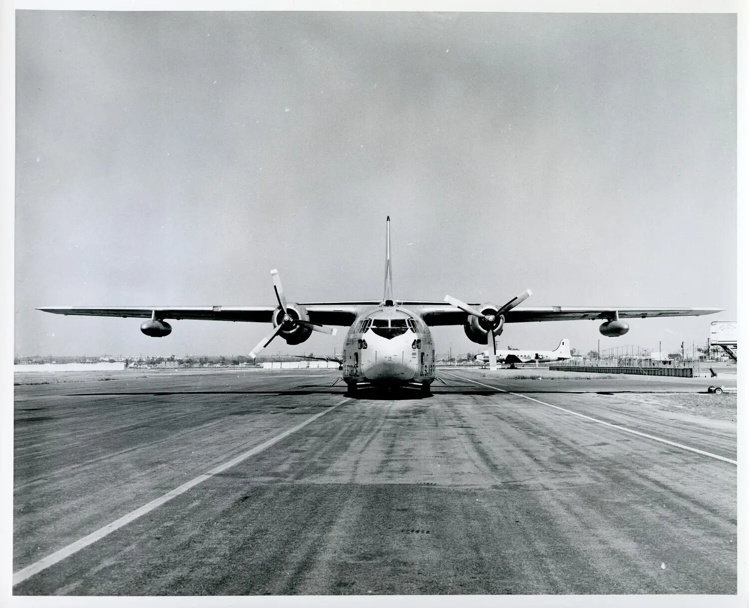 Head-On View of USAF Twin-Engine High-Wing Transport Aircraft on Runway, 8x10 Aircraft Collection