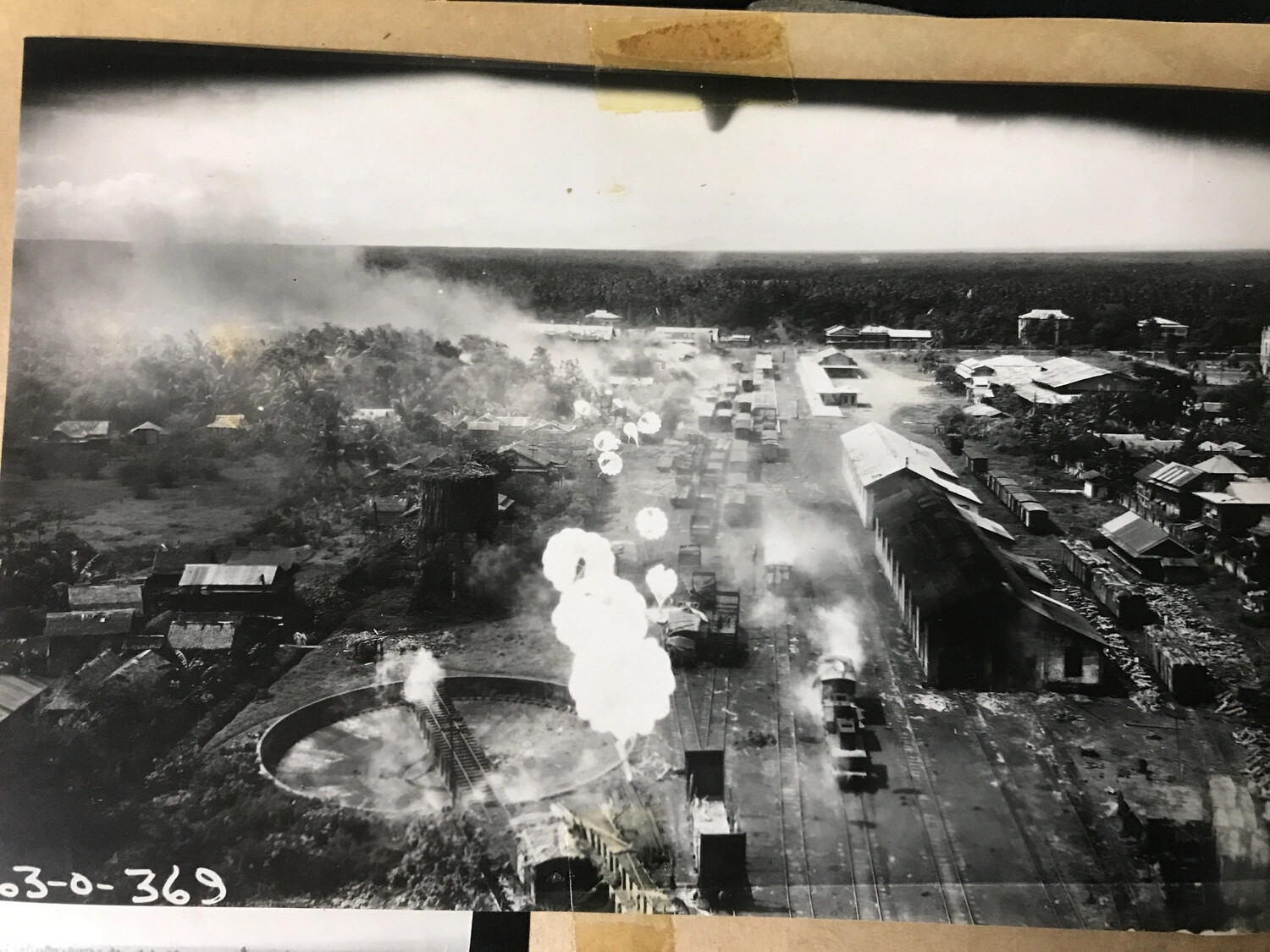 Album Page View of Railway Yard Strike Photograph with Archival Reference Number, Philippines, 312th Bomb Group
