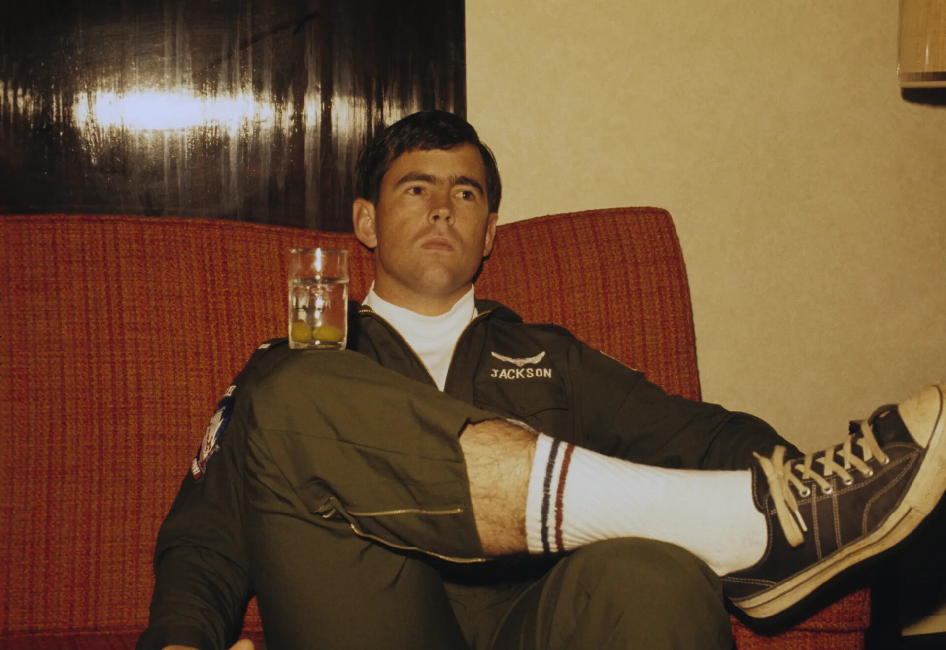 Portrait of Flight Crew Member 'Jackson' in Olive Drab Flight Suit, Off-Duty
