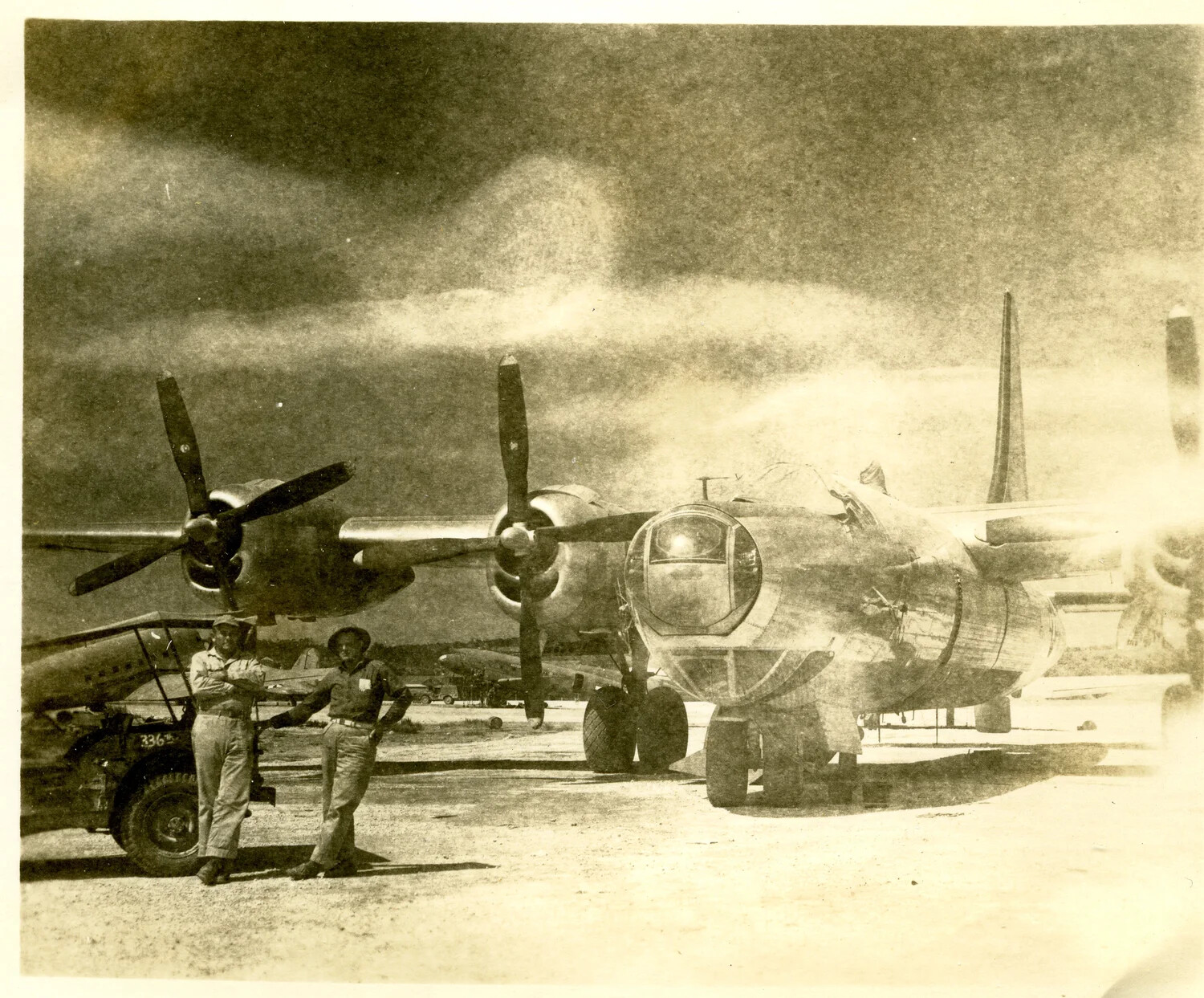 Boeing B-29 Superfortress on the Ramp with Ground Personnel and Jeep, Ie Shima, 1945