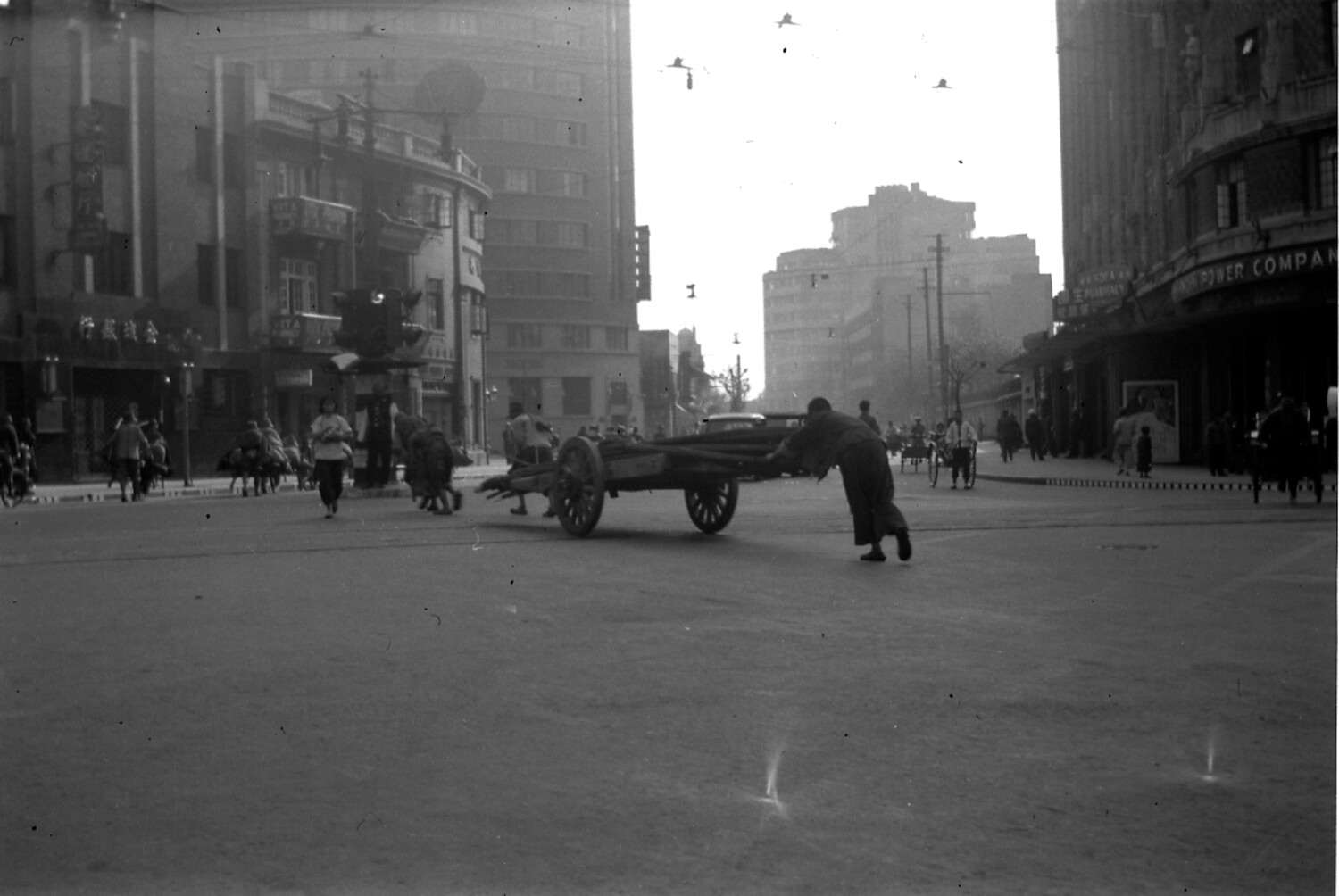 City Street Intersection with Traffic Signal and Handcart, China, Late 1930s-1940s