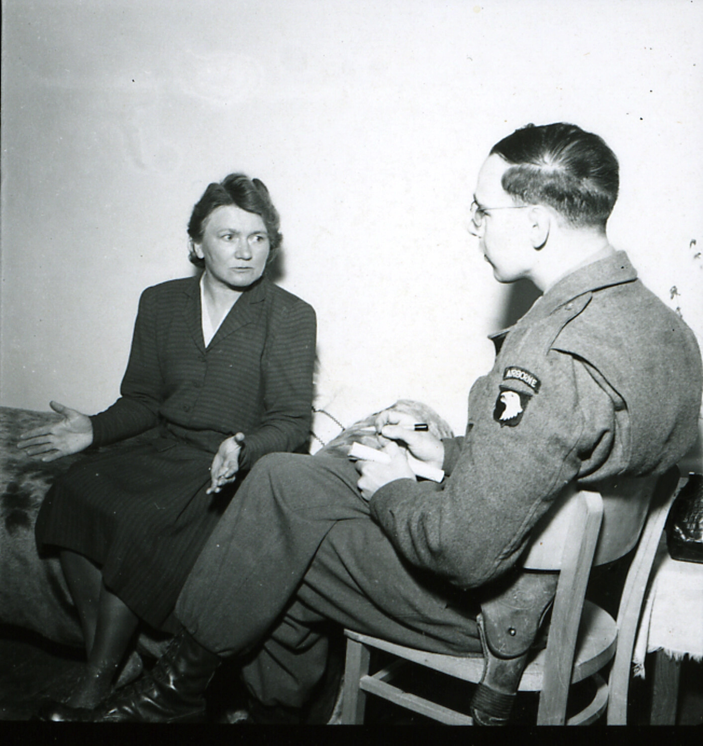 101st Airborne Paratrooper Interviews Civilian Woman Identified in Collection as 'Hitler's Sister,' 1945