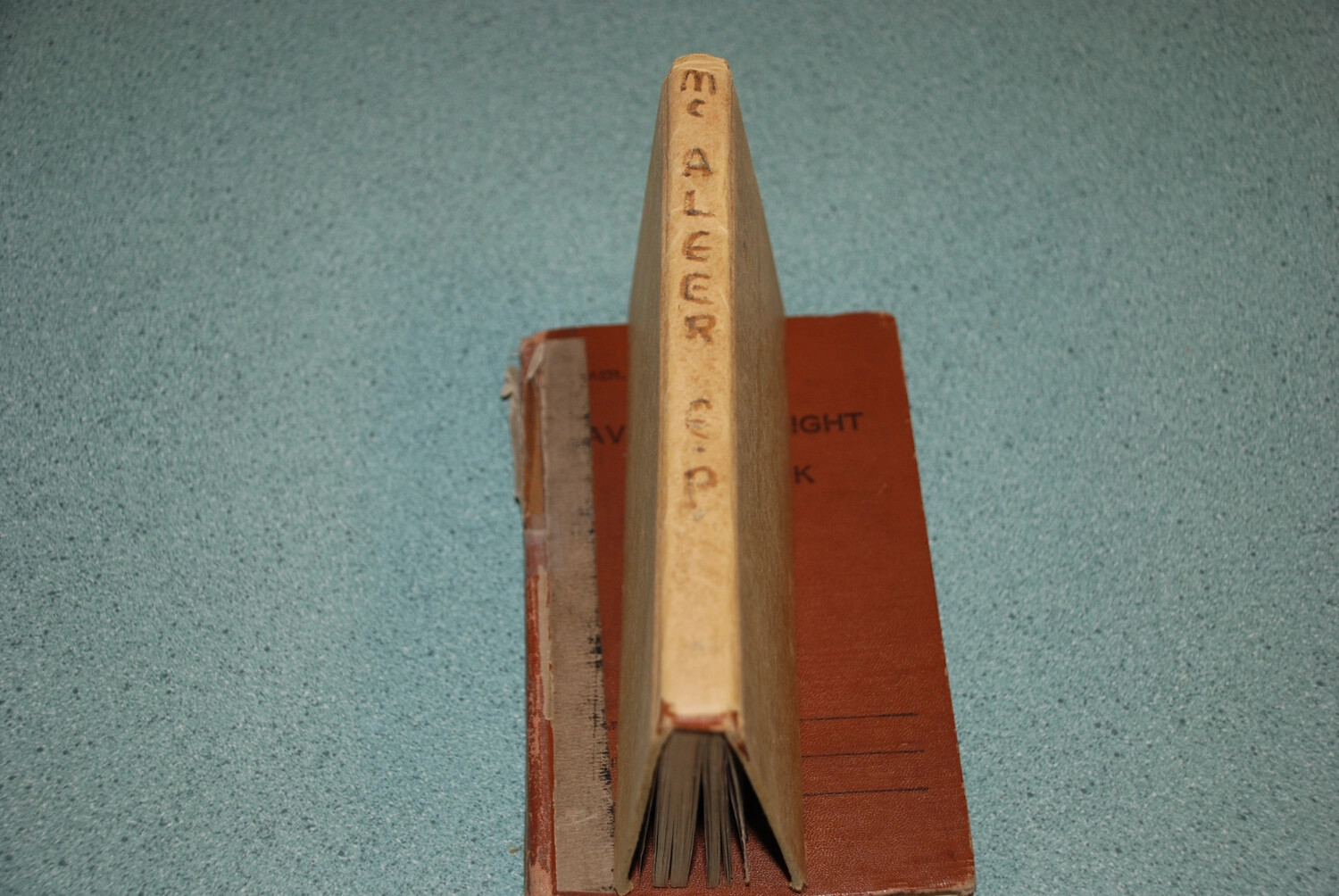 McAleer Personal Log Books, Fore-Edge Inscription 'McALEER C.P.' — Archival Reference Photograph