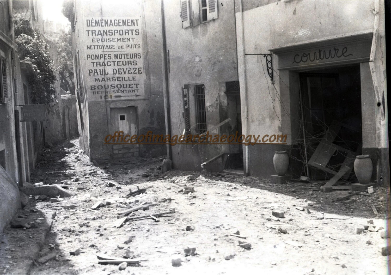 War-Damaged Street with Marseille Advertisement Signage, Southern France, WWII