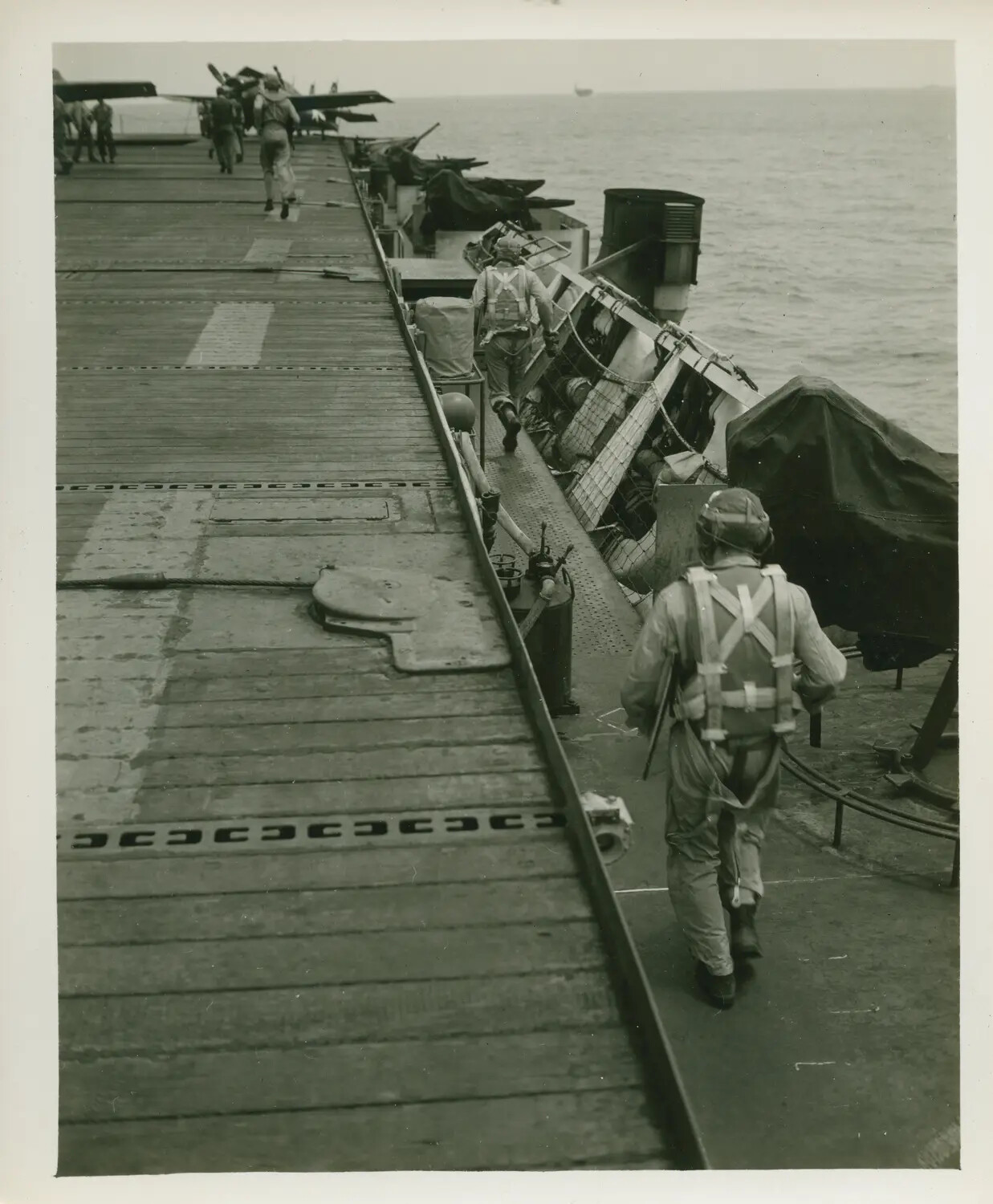 Aircrew Walking the Flight Deck and Catwalk of USS Petrof Bay (CVE-80), WWII Pacific Theater