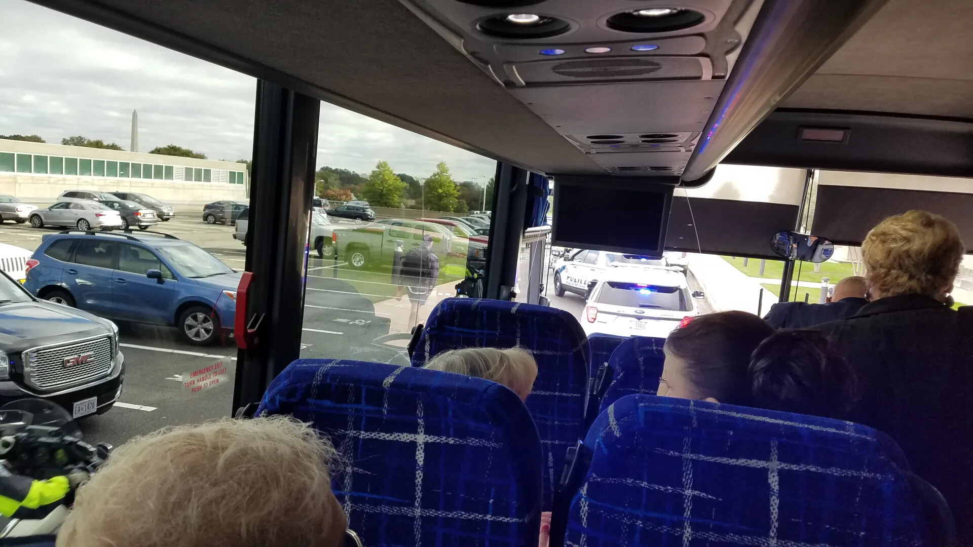 Police-Escorted Tour Bus Near Washington Monument, Gary 'Mike' Rose Medal of Honor Visit