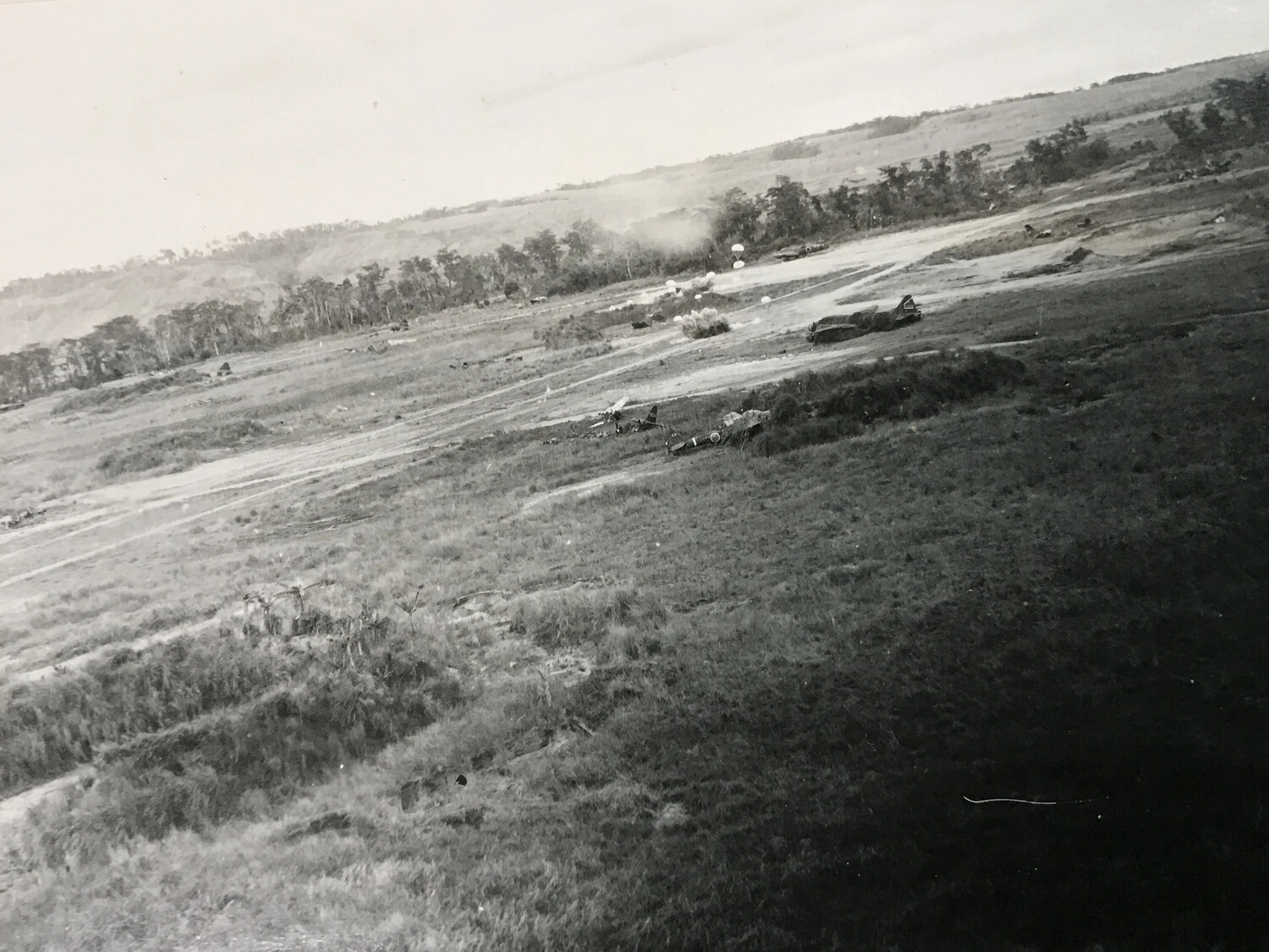 Aftermath View with Residual Parafrag Parachute and Wrecked Aircraft