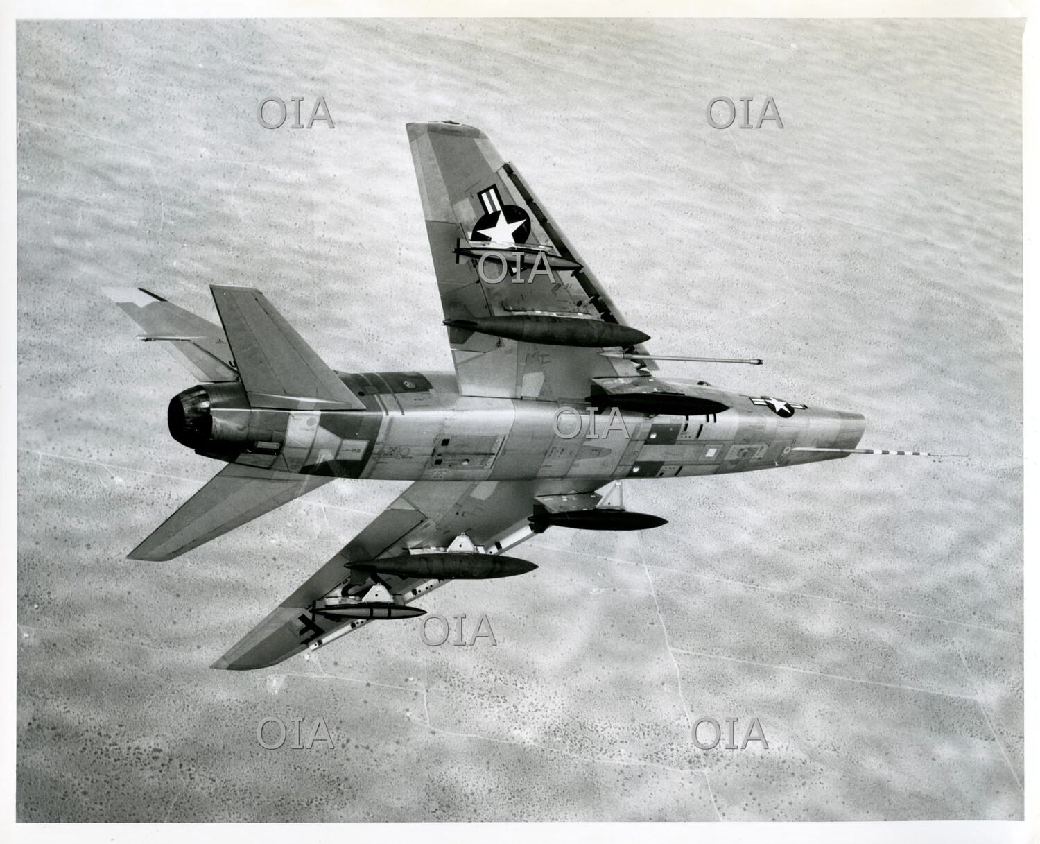 USAF Swept-Wing Jet Fighter-Bomber in Flight, Likely Republic F-105 Thunderchief, Cold War Era
