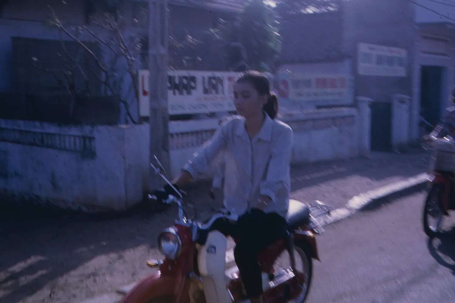 Vietnamese Woman on Moped, Street Scene, Tet 1968, Vietnam War Era