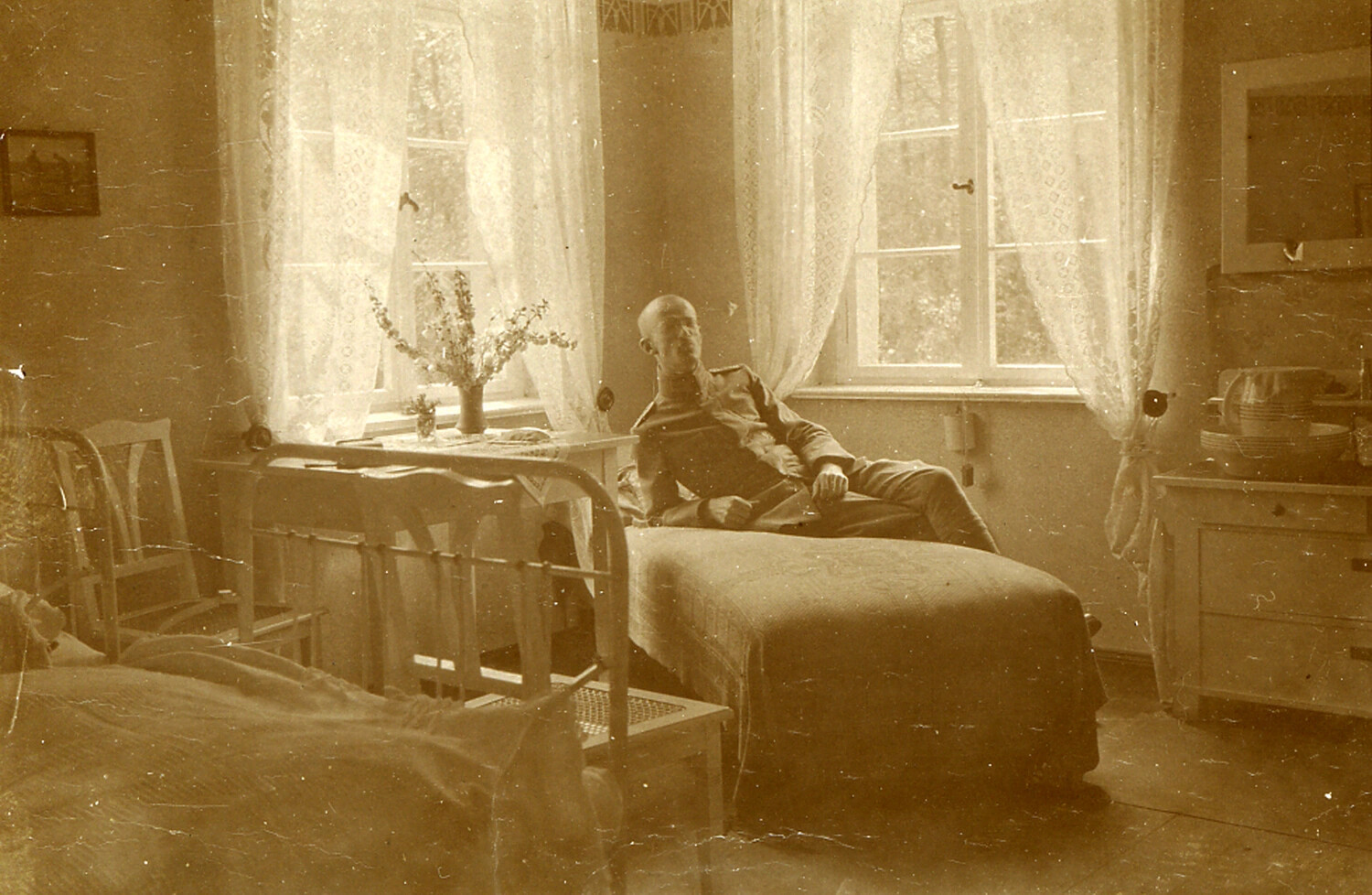 German Officer at Rest in a Requisitioned Billet Interior, World War I, c. 1914-1918