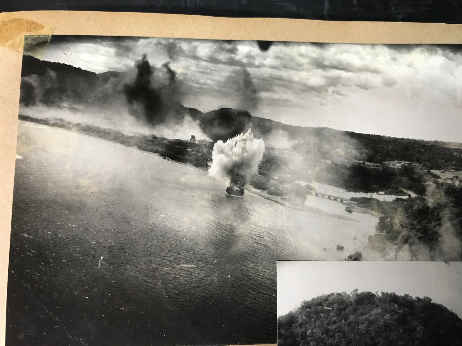 Aerial Strike Photograph: Bomb Burst Along River Target with Bridge, Pacific Theater, WWII