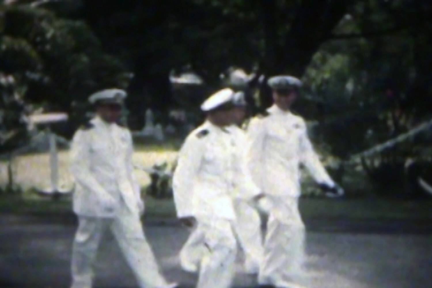 Three U.S. Navy Officers in Dress Whites Walking, NAS Kaneohe Bay, Hawaii, Korean War Era