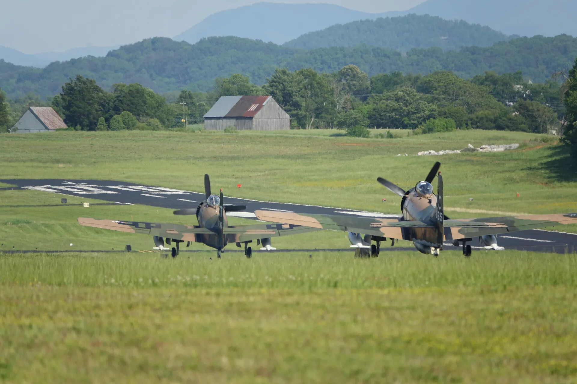 Two A-1 Skyraiders Taxiing at Rural Airfield, Tennessee, May 2019