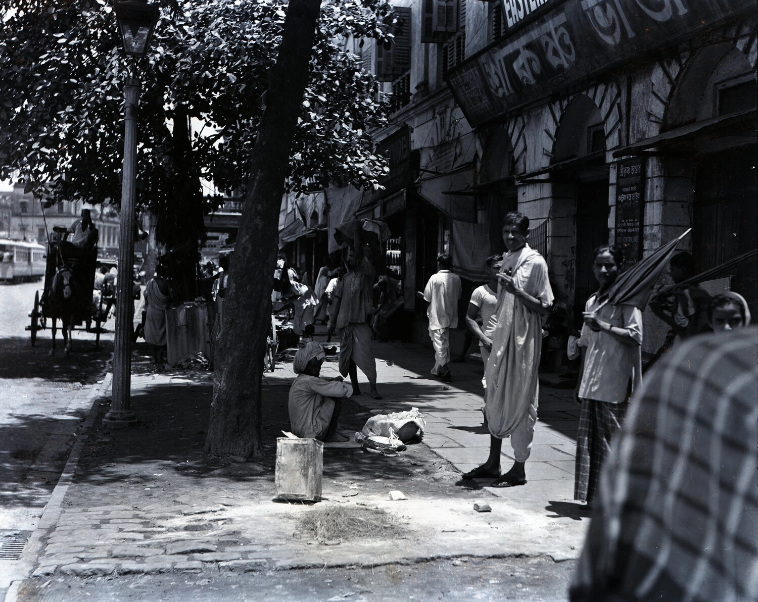 Street Scene with Horse-Drawn Carriage, Calcutta, India - WWII China-Burma-India Theater Collection