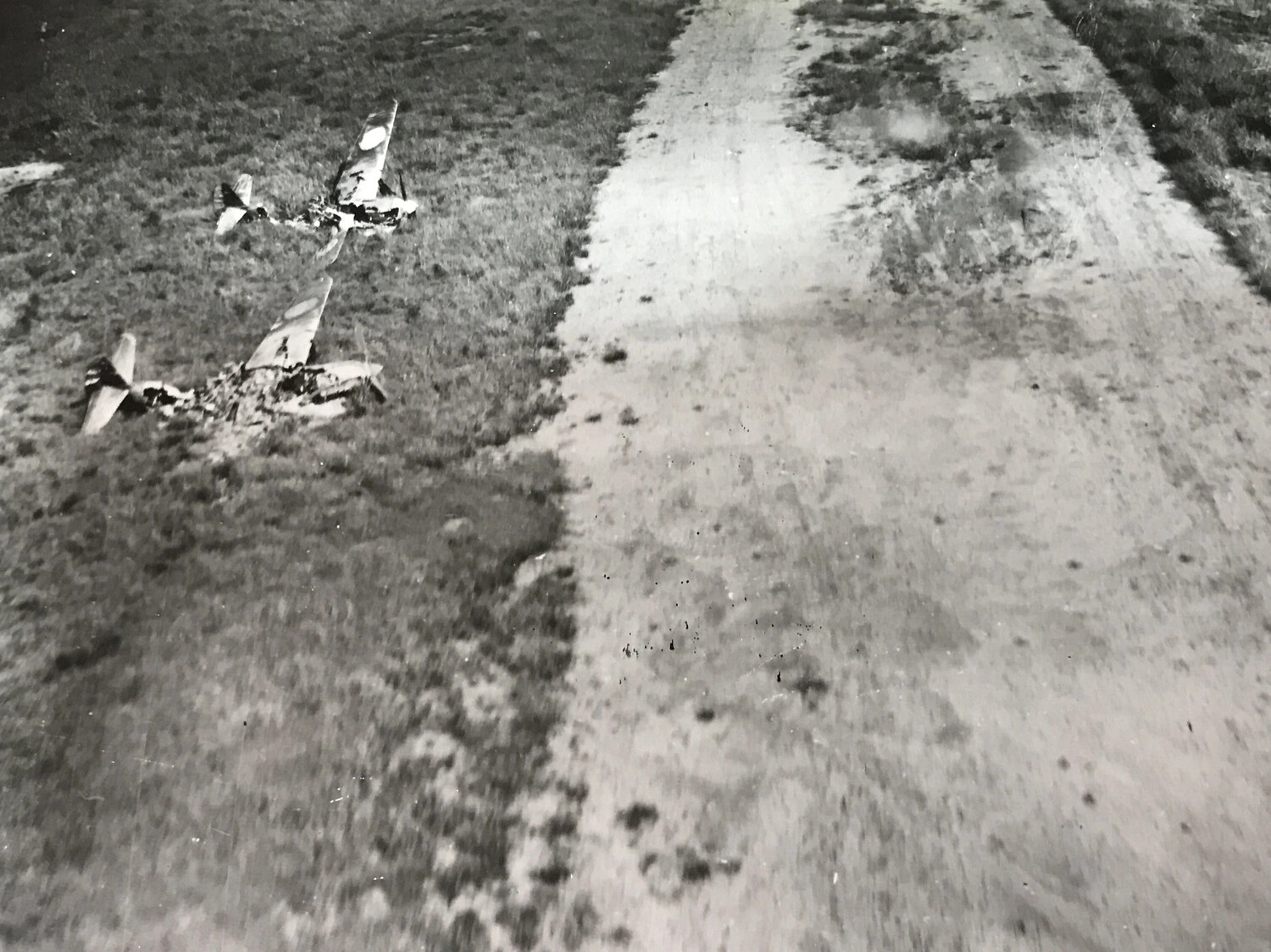 Destroyed Japanese Fighter Aircraft Beside Runway, New Guinea Airfield