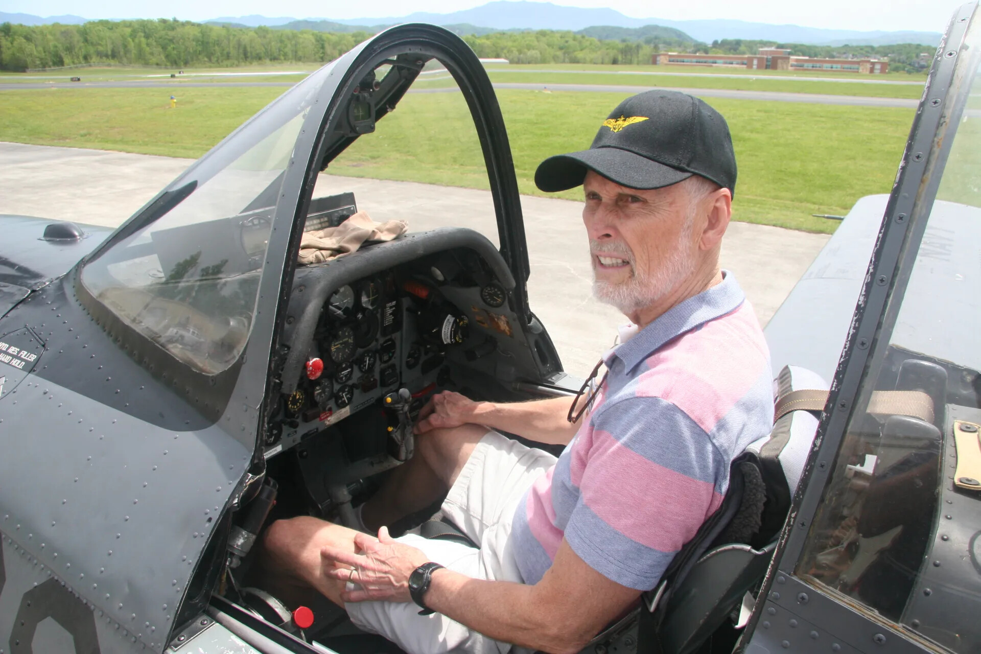 Veteran Seated in Vintage Aircraft Cockpit, Operation Tailwind Reunion, April 2016