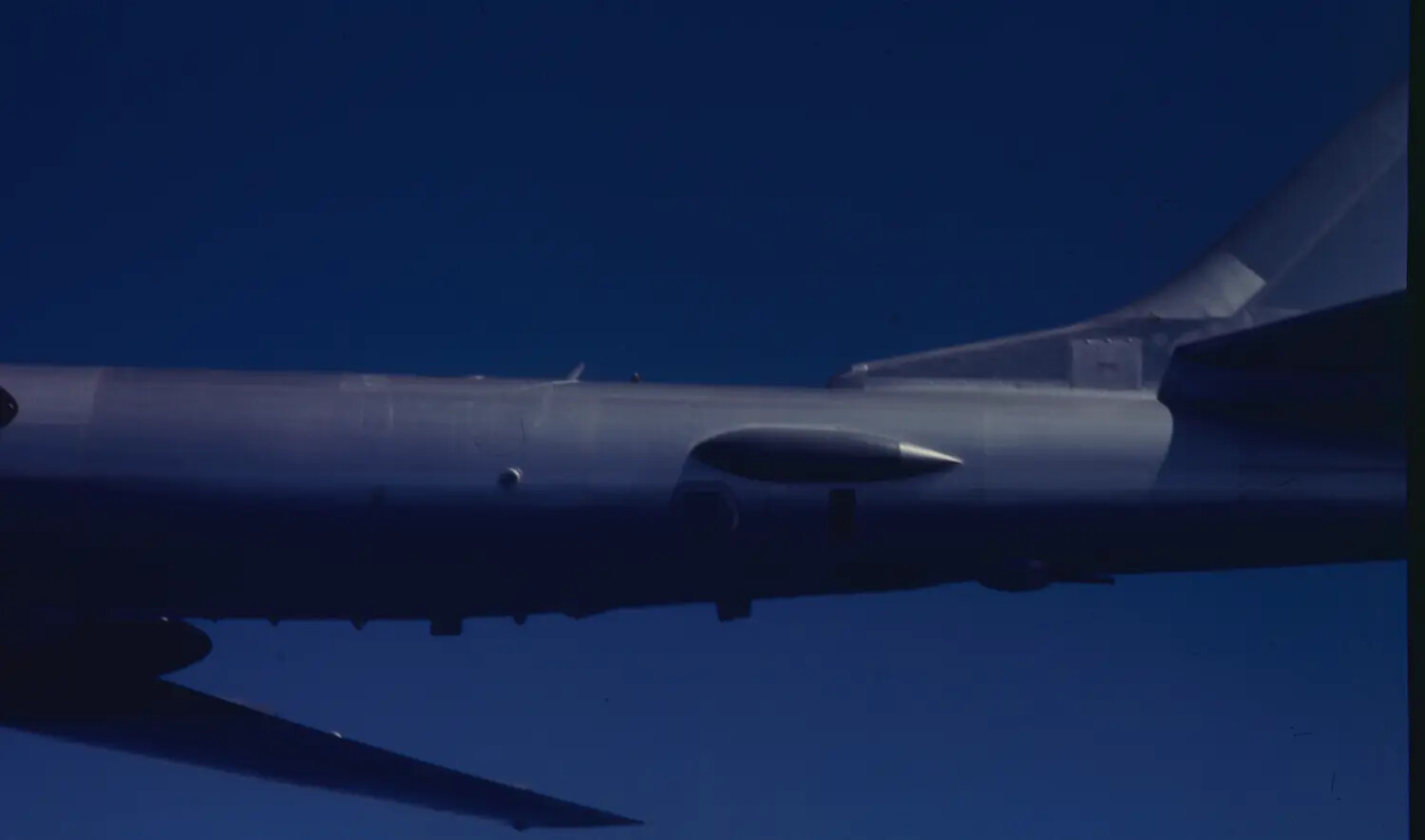 Close Air-to-Air Detail of U.S. Navy Jet Fuselage and External Tank, VF-162 'BEAR' Aircraft, USS Ticonderoga, Vietnam War Era