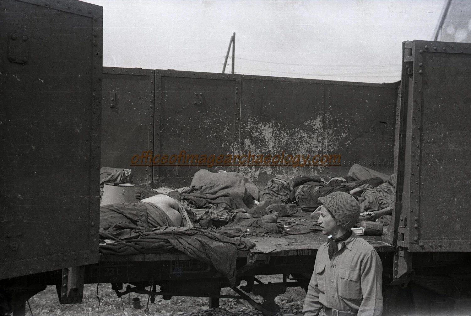 US Soldier Documents Railway Car with Victims' Remains, Germany, 1945