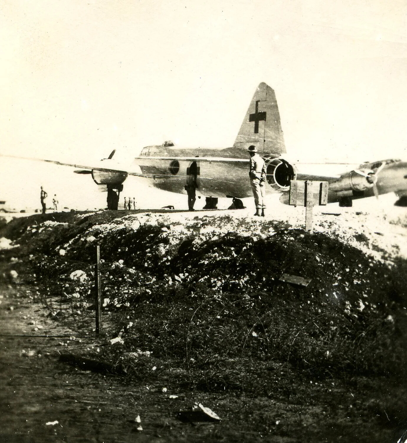 Guard Posted Near Japanese Envoy Bomber's Tail, Ie Shima Airfield, 19 August 1945
