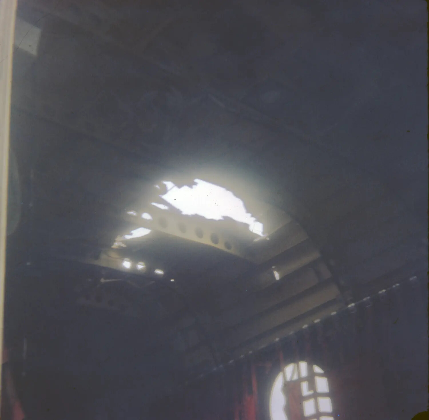 Interior View of Damaged Roof Structure with Light Aperture, Vietnam, Vietnam War Era