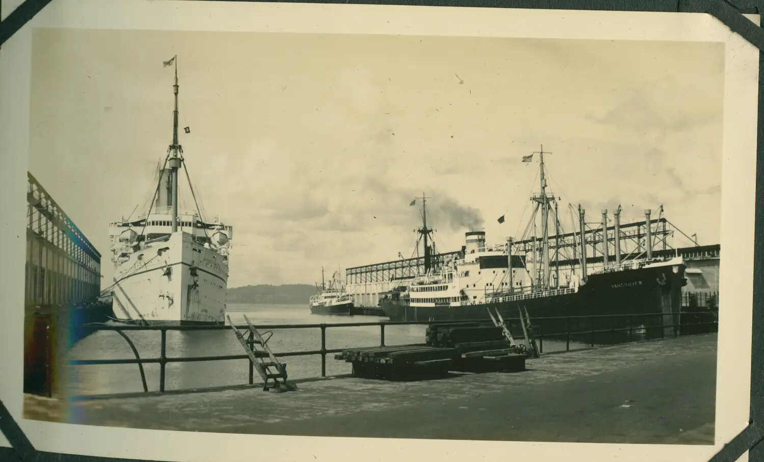 Merchant Vessels Docked at a Panama Canal Zone Pier, WWII Era