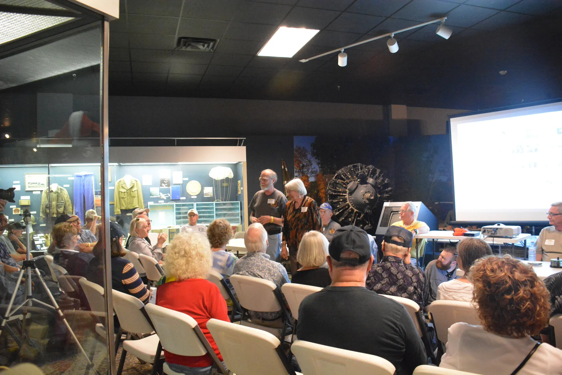 Reunion Attendees and Presenter Amid Museum Exhibits, Tennessee Museum of Aviation