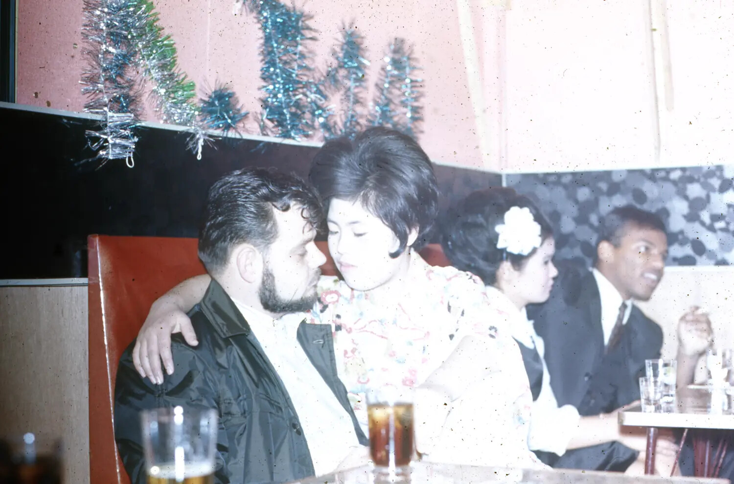 Sailor and Companion at Holiday-Decorated Bar Booth, Vietnam-Era Liberty Port