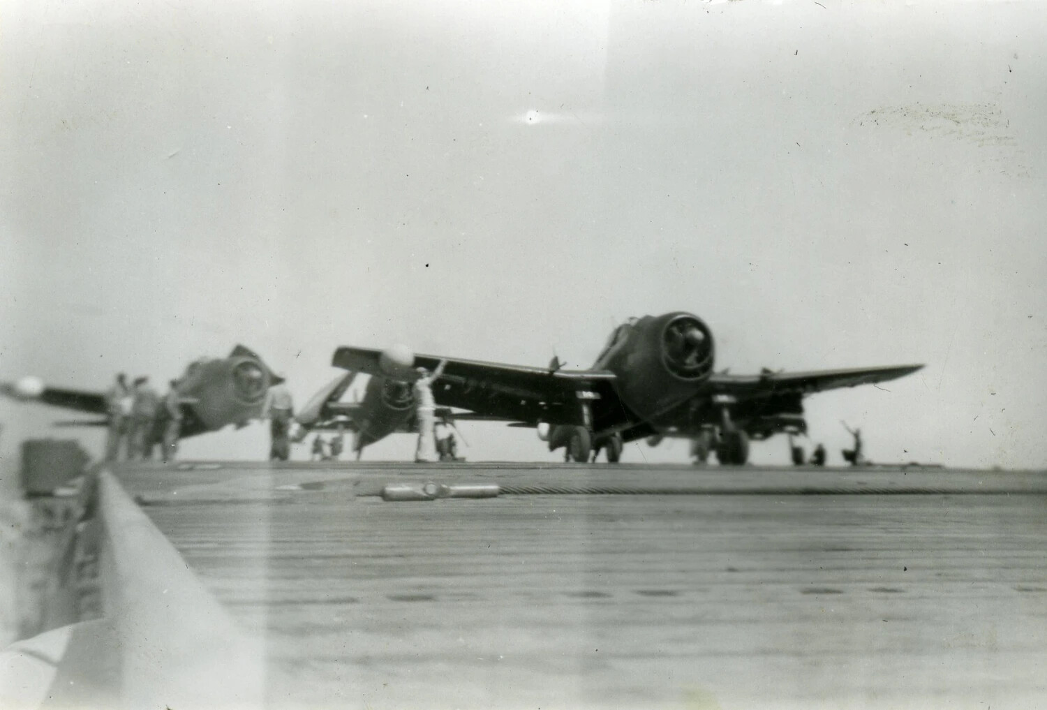 Folded-Wing F4U Corsairs on Carrier Flight Deck, VMF-214 Album, 1945