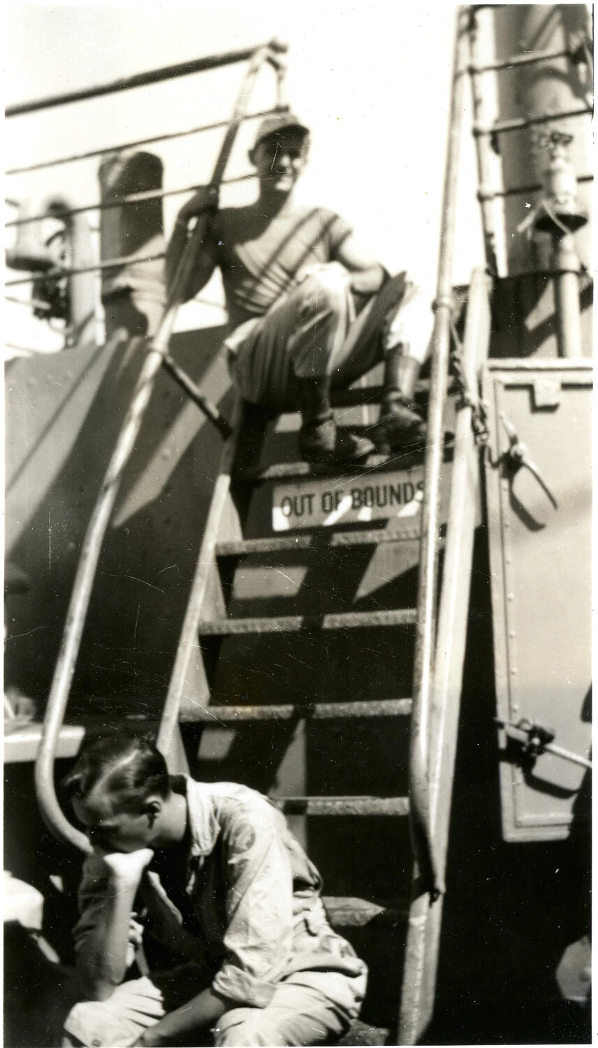 Servicemen Aboard Transport Ship Near 'Out of Bounds' Ladder, 345th Bomber Group Collection, Ie Shima