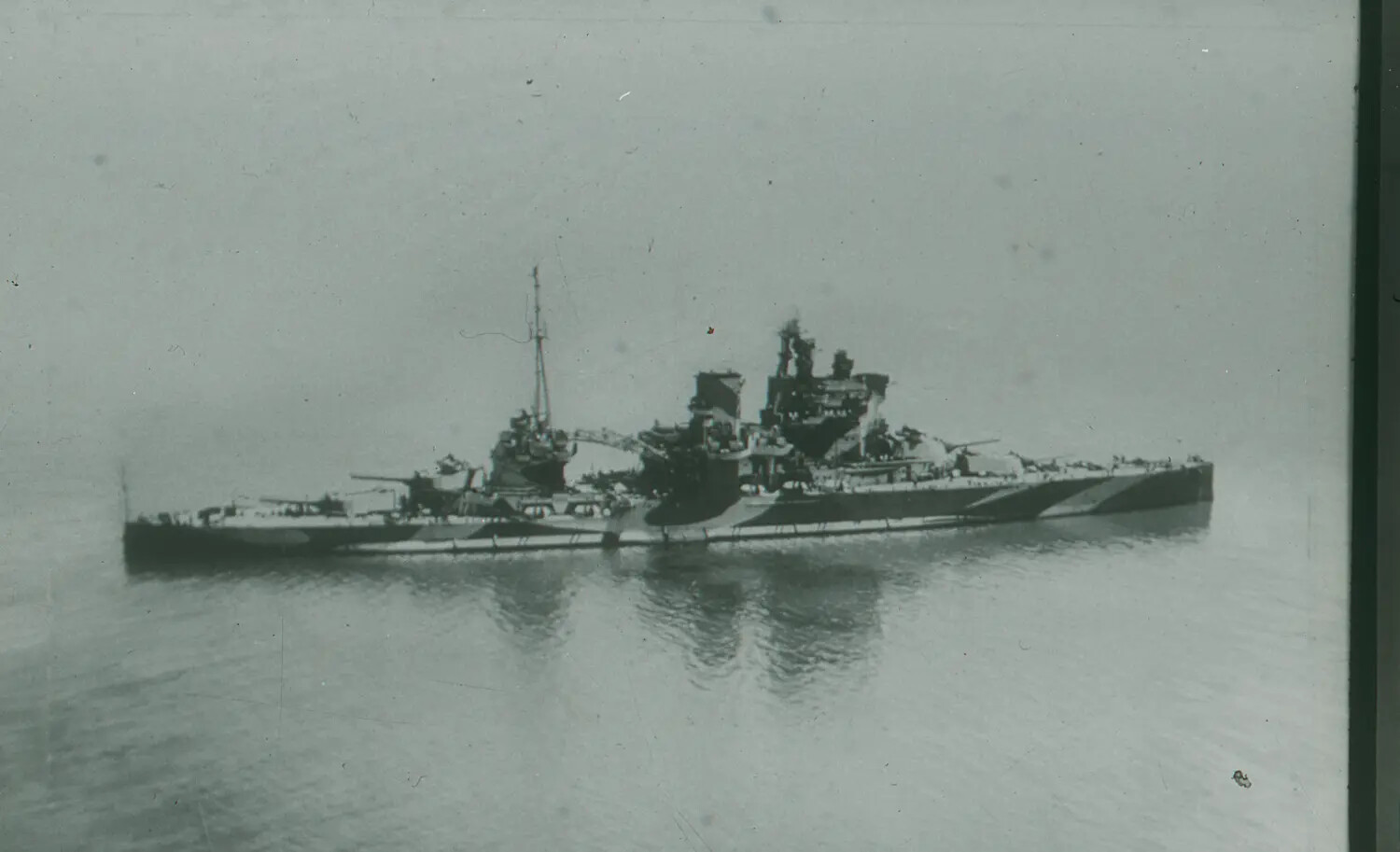 Heavy Cruiser at Anchor in Dazzle Camouflage, WWII-Era 35mm Negative