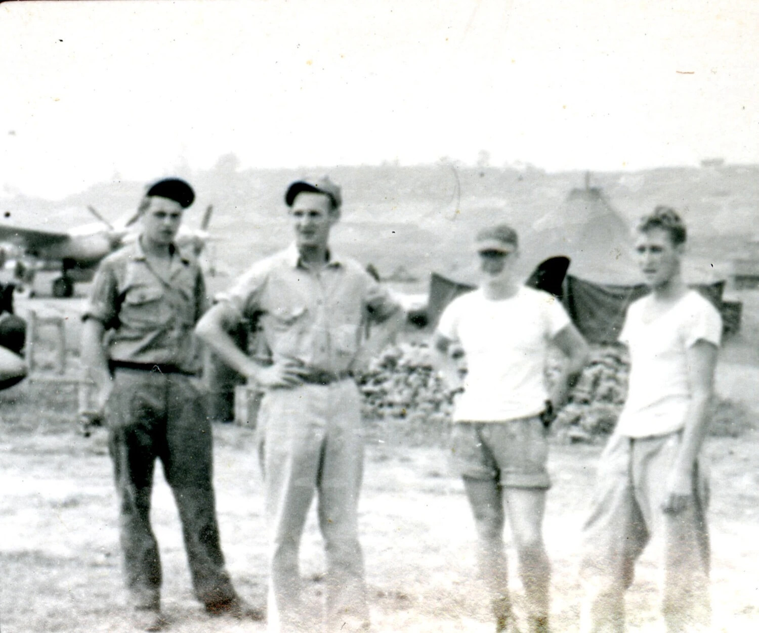 Four Servicemen at a Forward Airfield, Possibly CBI (Burma) Theater, WWII Era